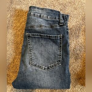 SO super high rise ultimate jegging jeans. Factory made holes. Size 3/26W